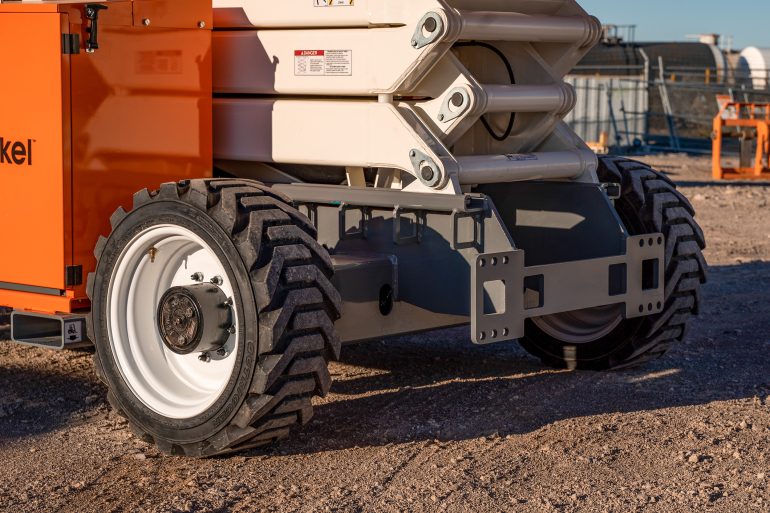 A diesel powered rough terrain scissor lift.