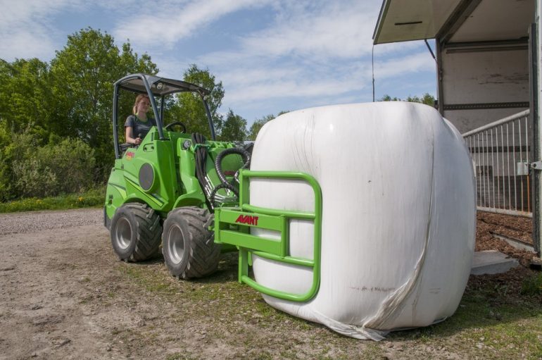 A round bale grab attachment for the Avant compact loader.